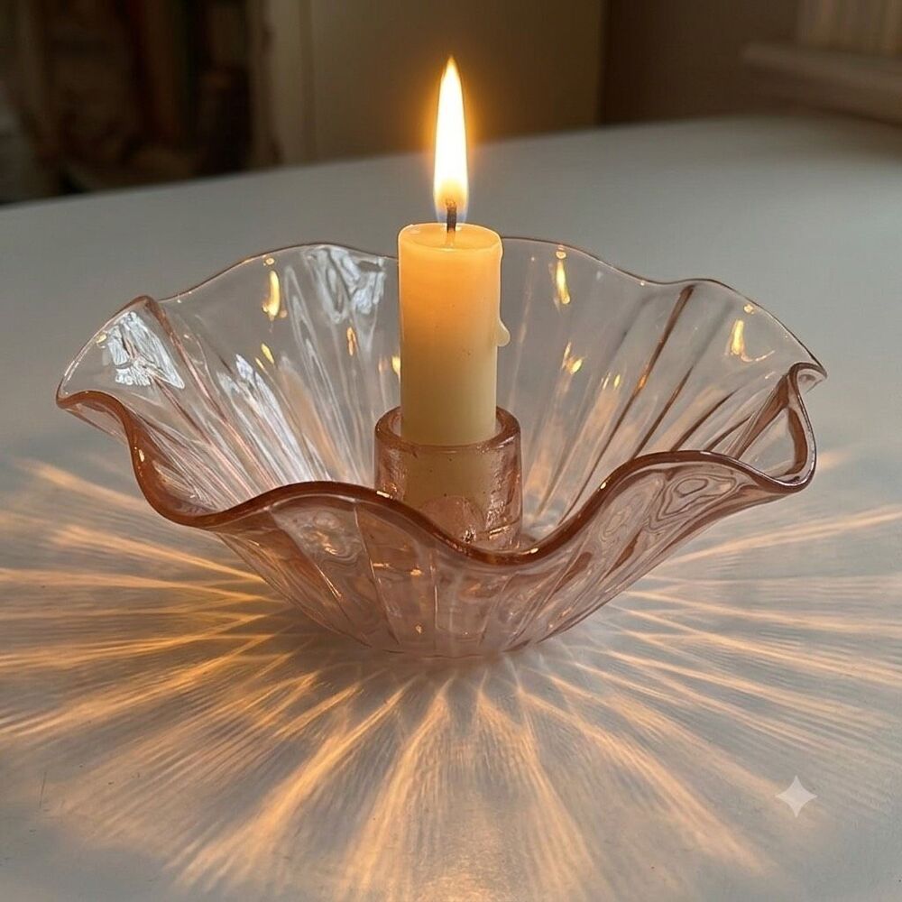 Vintage pink depression glass candle holder ruffled edges.